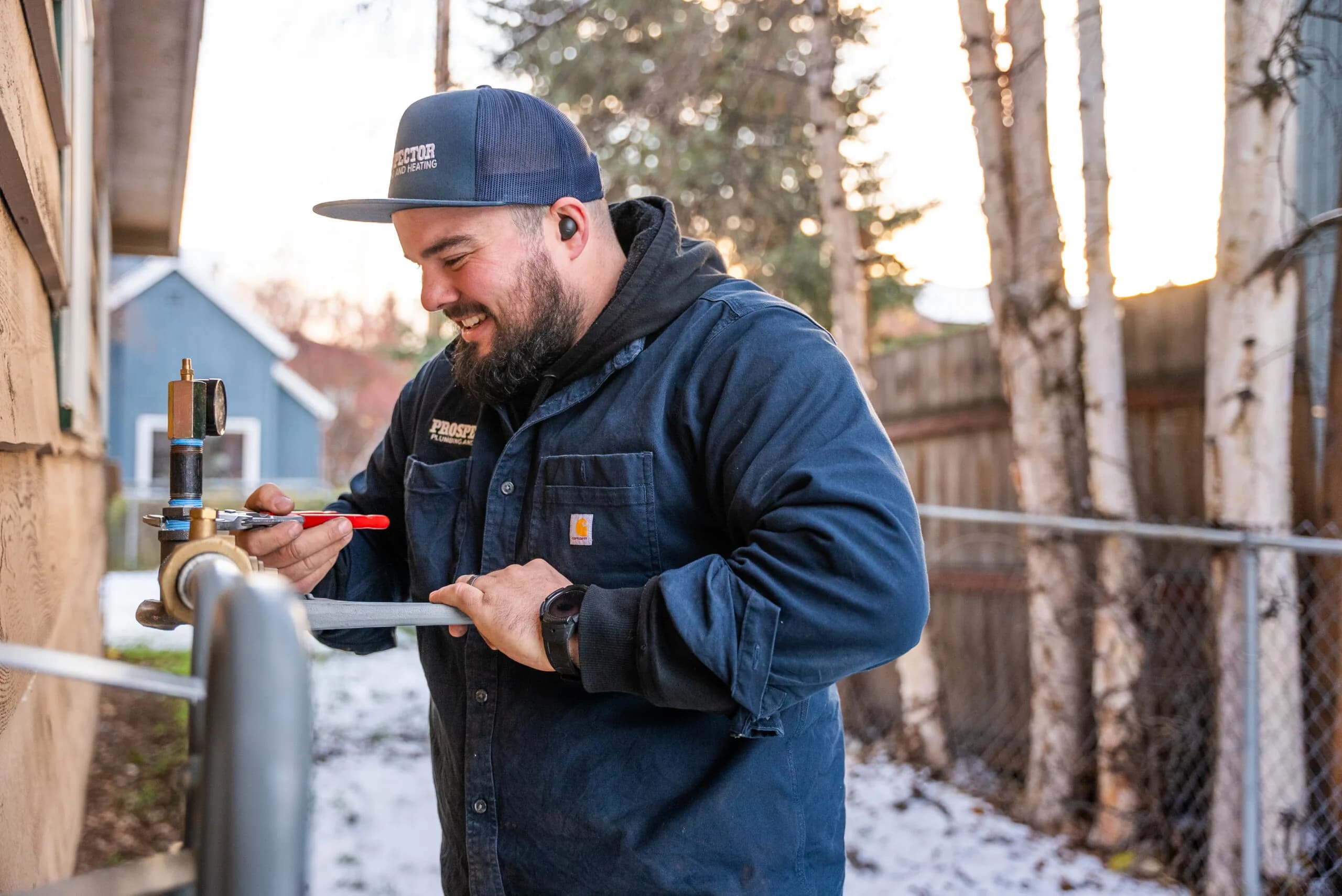 A Prospector plumber repairing a frozen pipe